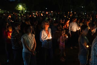 Mourners take part in a vigil at Lynnhurst Park following a shooting earlier in the day at Annunciation Church in Minneapolis, Minnesota, U.S. 27 August 2025